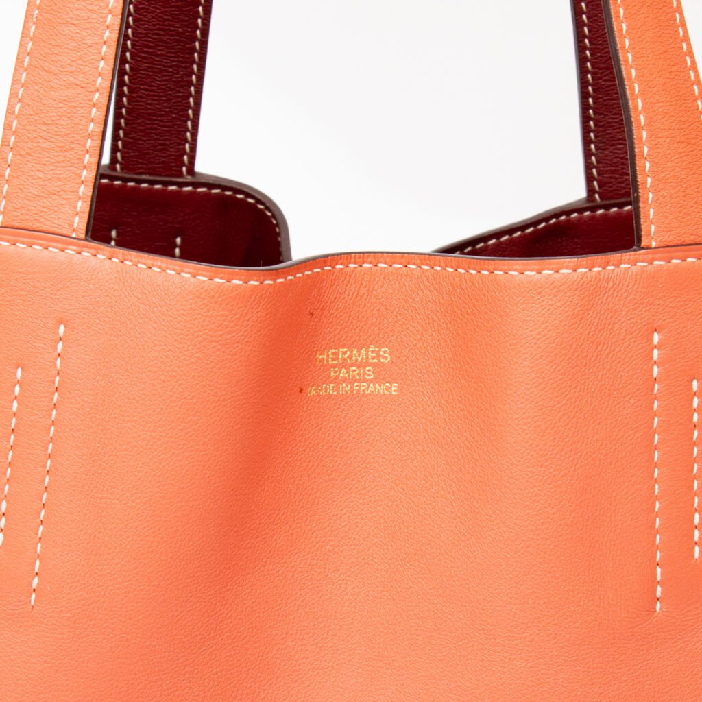 Sac Hermès Shopper Double Sense 28 en cuir Veau Swift Cienne X Flamingo