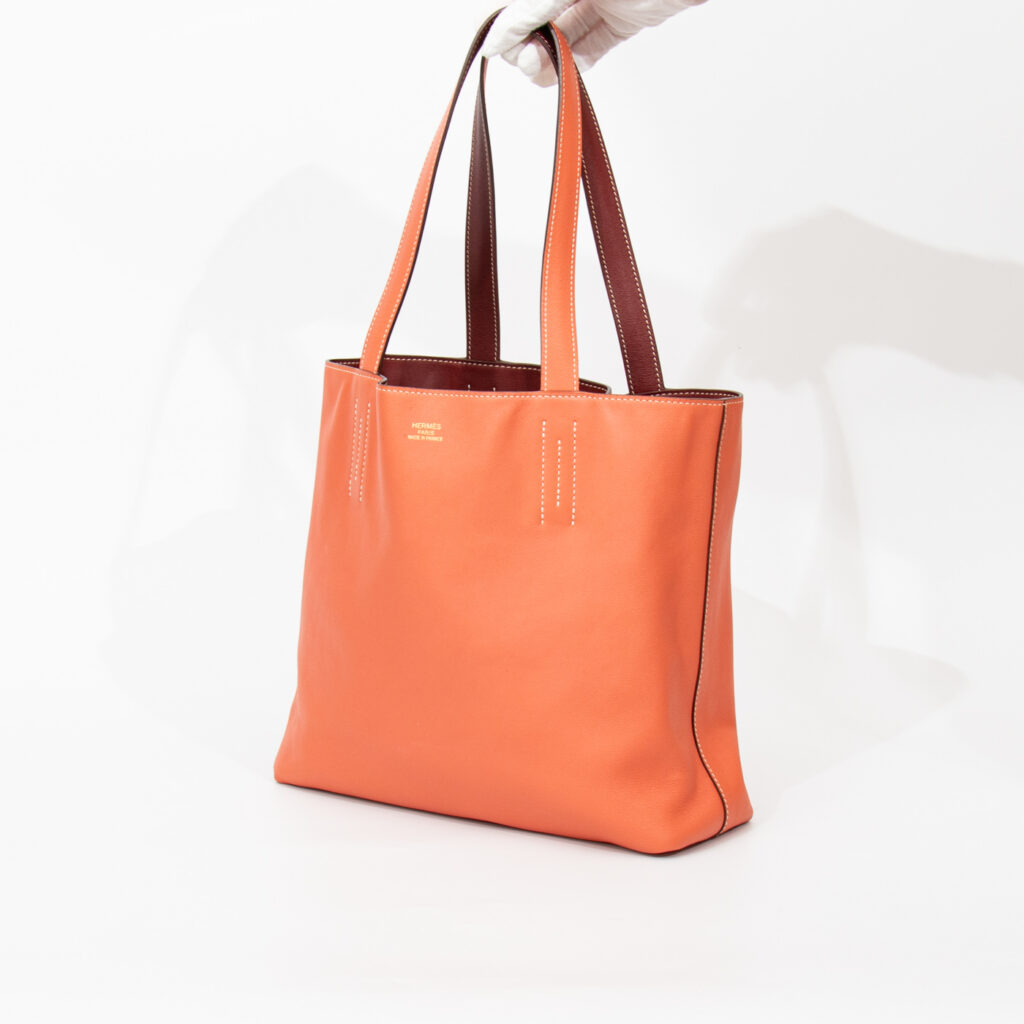 Sac Hermès Shopper Double Sense 28 en cuir Veau Swift Cienne X Flamingo