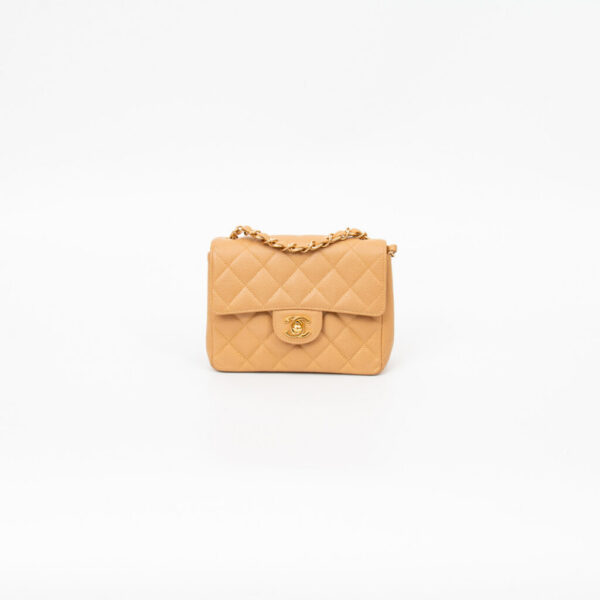 Sac Chanel Mini Square en cuir caviar beige avec finitions dorées