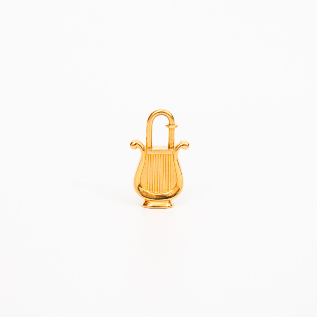 Hermès Cadena Harfe Schloss Bag Charm Gold