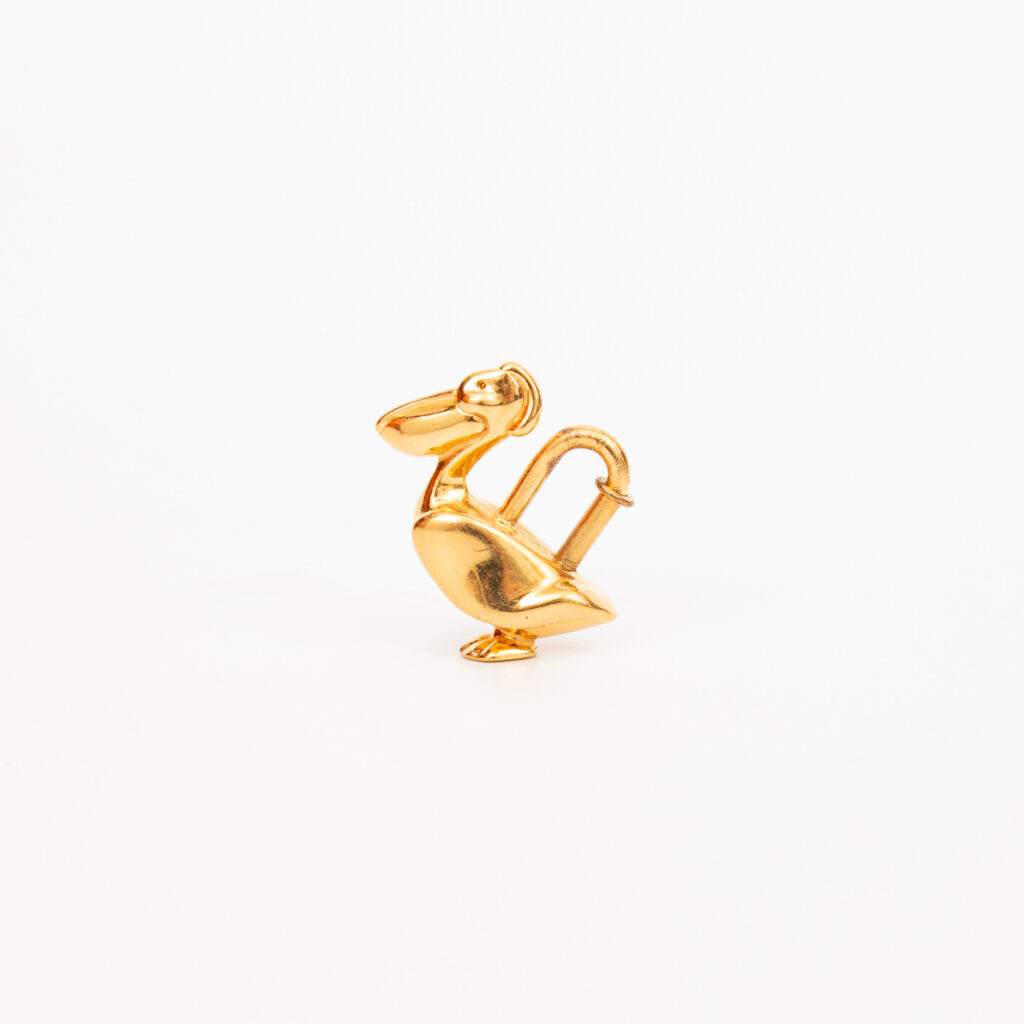 Hermès Vintage Pelican Cadena Lock Anhänger Gold 1992