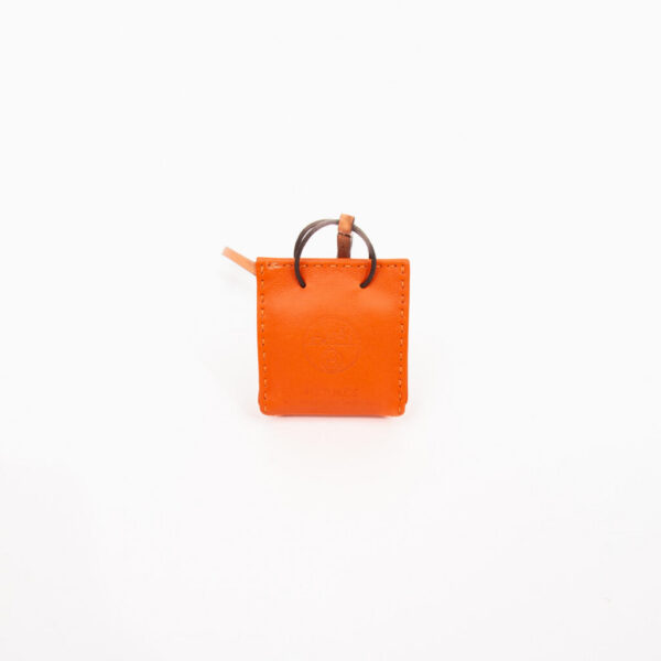 Sac cabas Hermès avec breloque en cuir orange