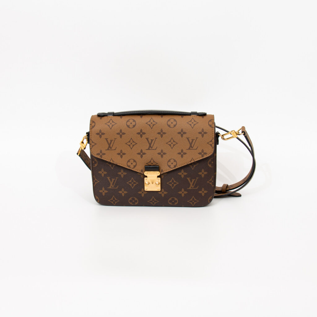 Louis Vuitton Tasche Pochette Métis Monogram Reverse Canvas Braun Mit Goldener Hardware