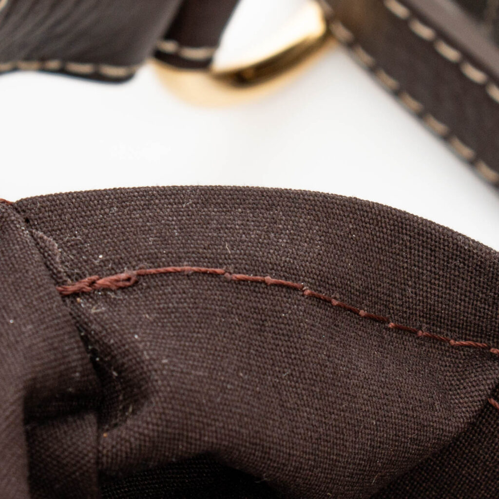 Bolso Louis Vuitton Mini Lin Pochtte mediano en color marrón