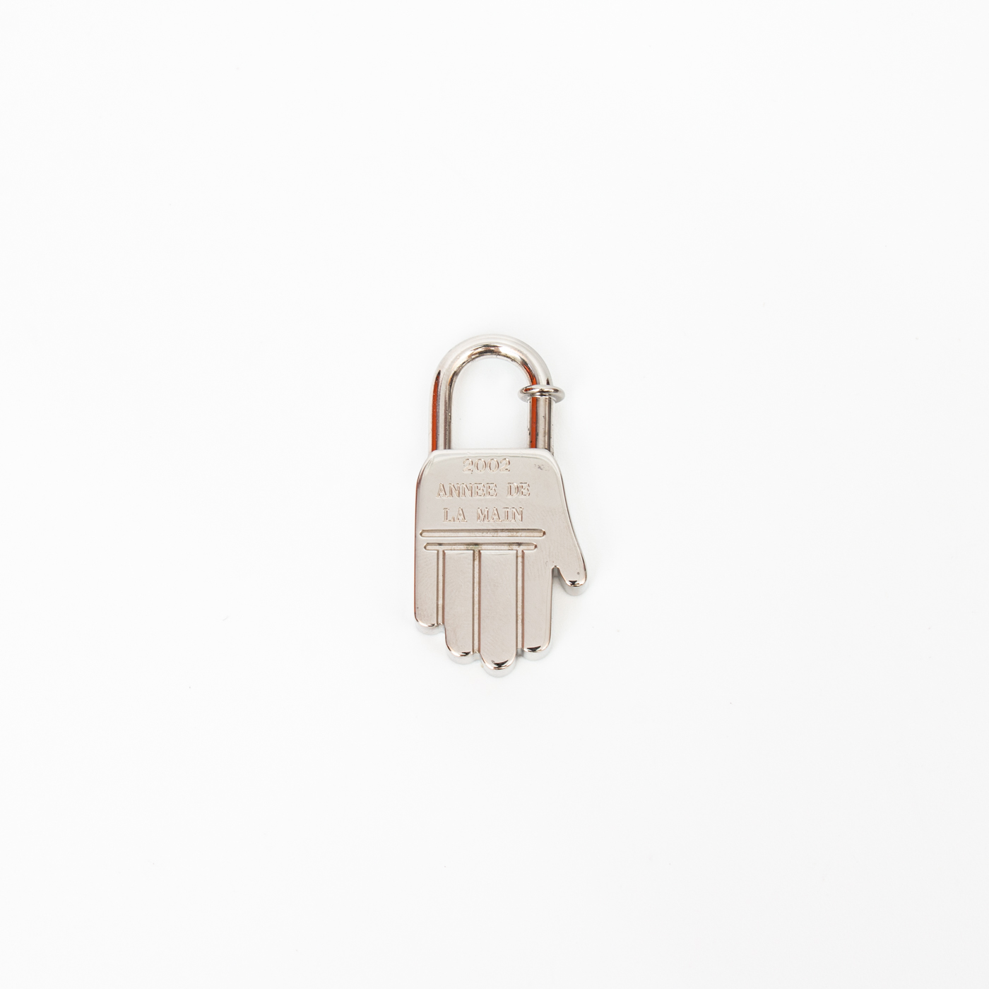 Breloque Hermès Cadena Lock Hand 2002 en métal argenté