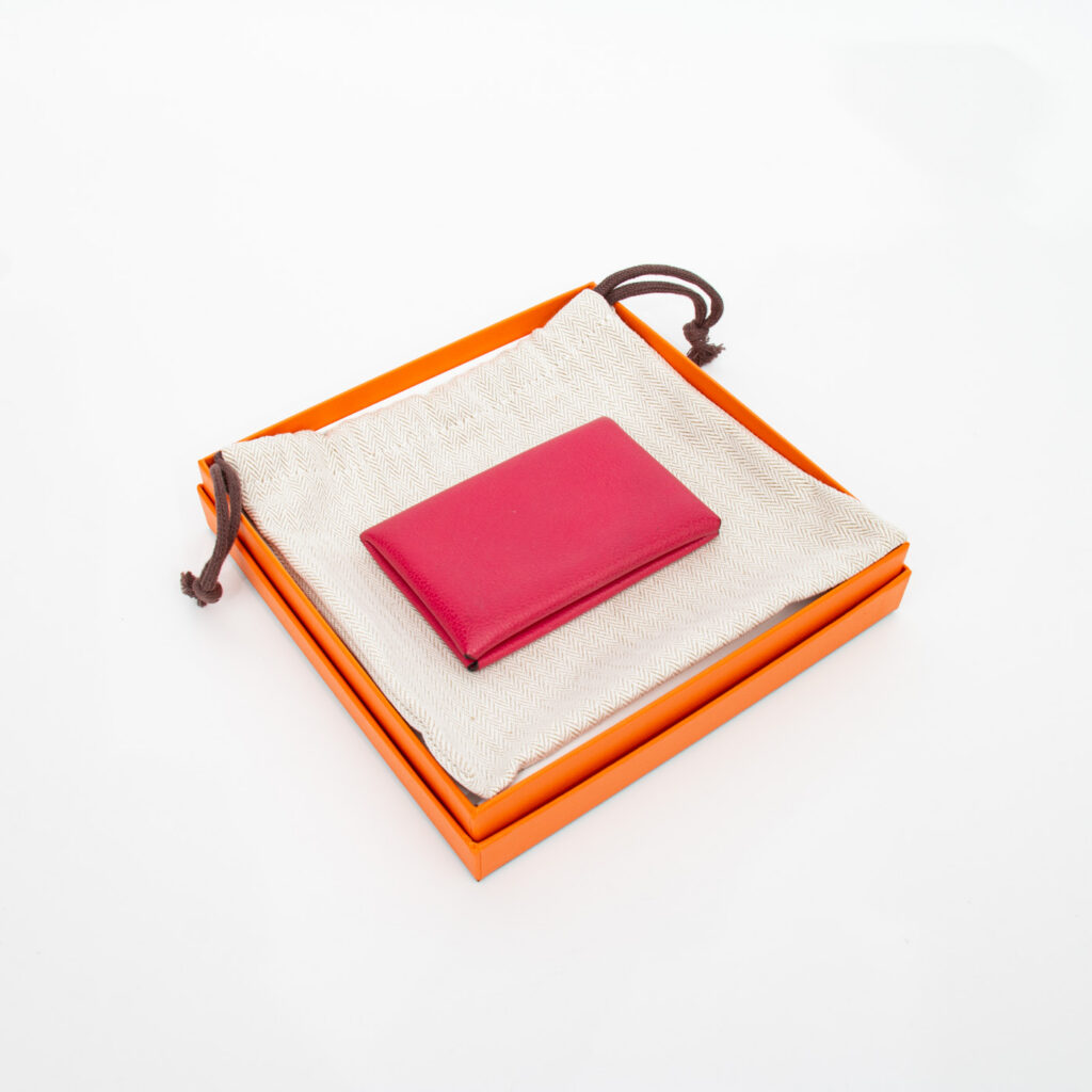 Tarjetero Hermès Calvi de piel rosa