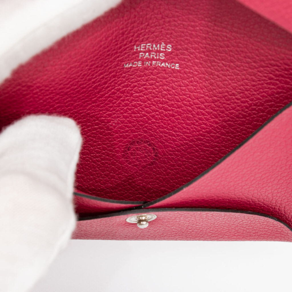 Tarjetero Hermès Calvi de piel rosa